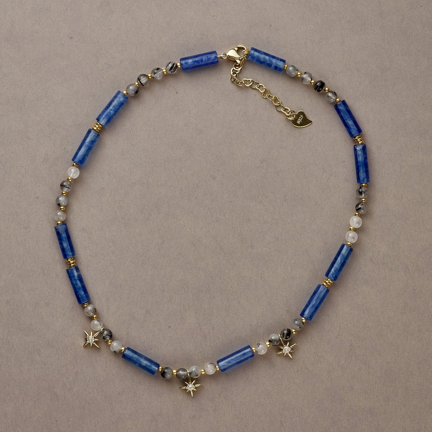 Cosmic Blue necklace in full-circle view, featuring deep blue Kyanite beads and gold-filled accents for an elegant, bold design.