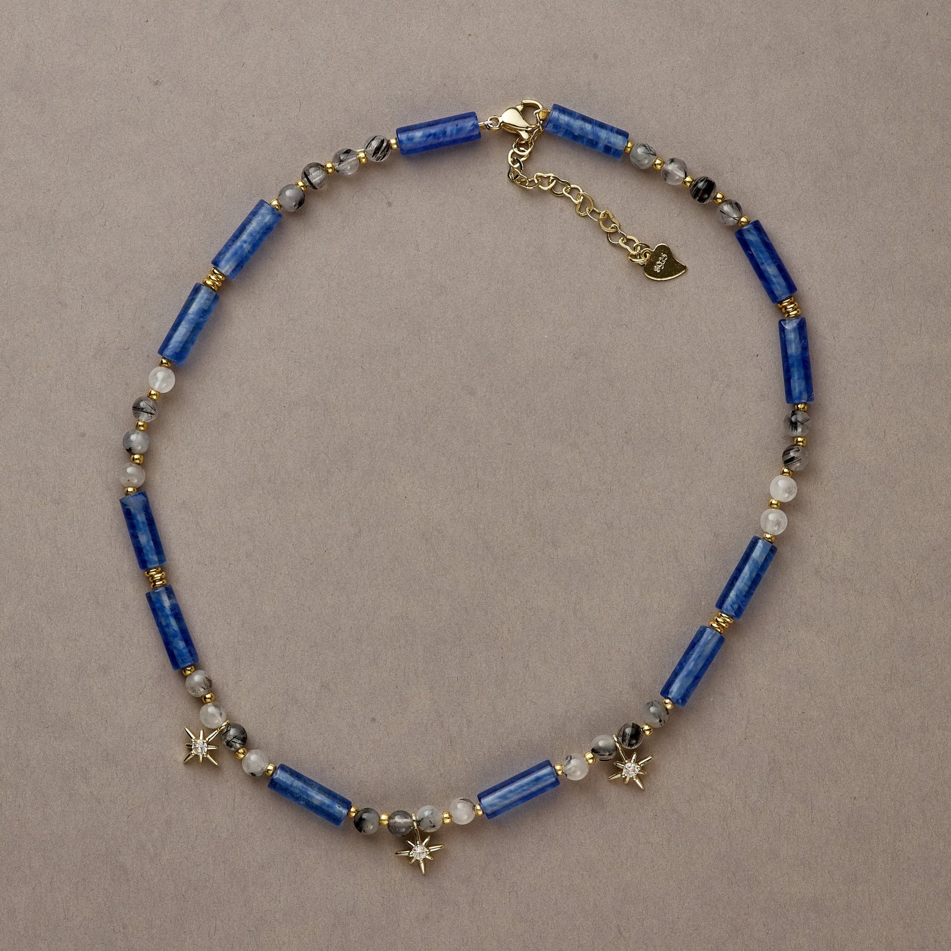 Cosmic Blue necklace in full-circle view, featuring deep blue Kyanite beads and gold-filled accents for an elegant, bold design.