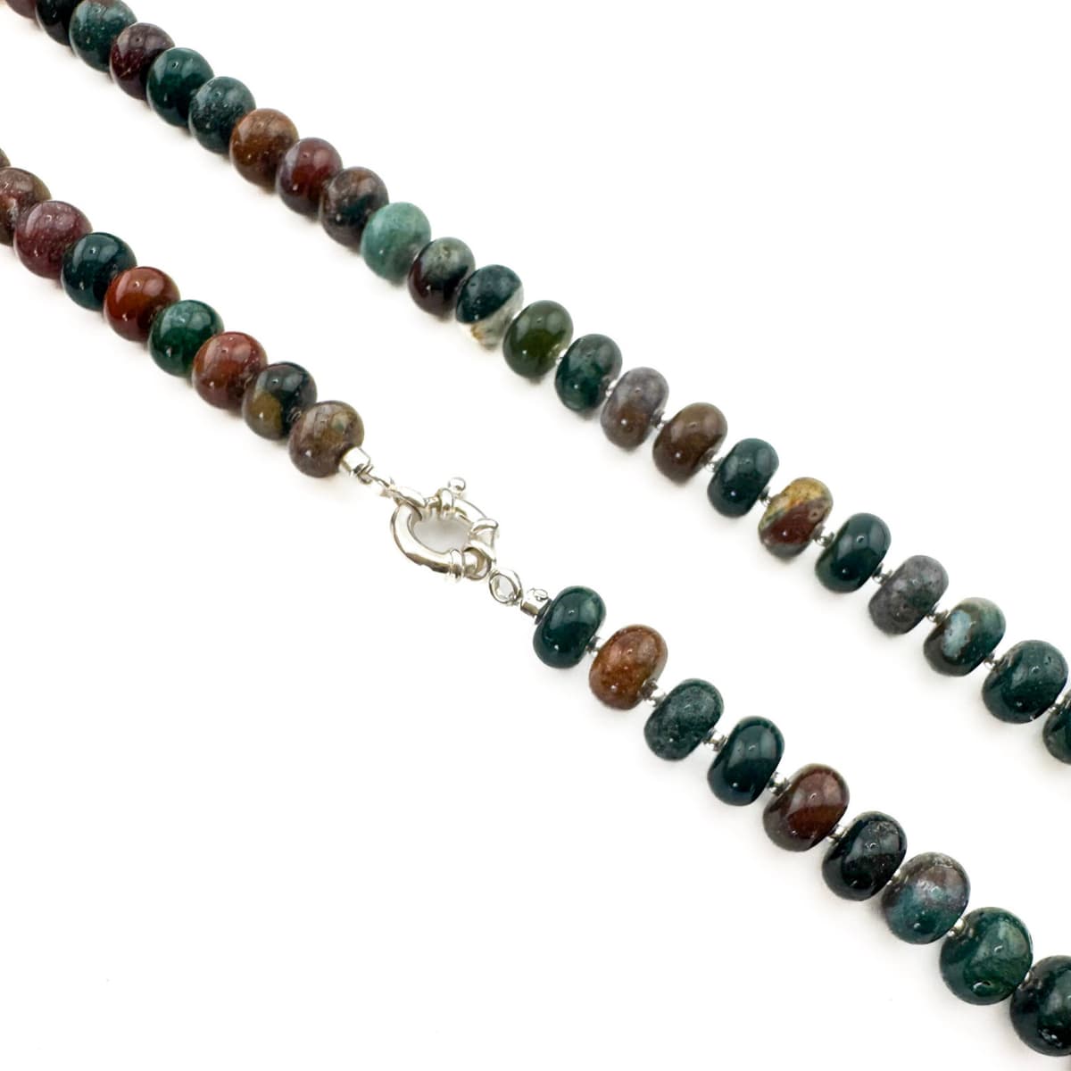 Beaded necklace with a silver clasp on a white background
