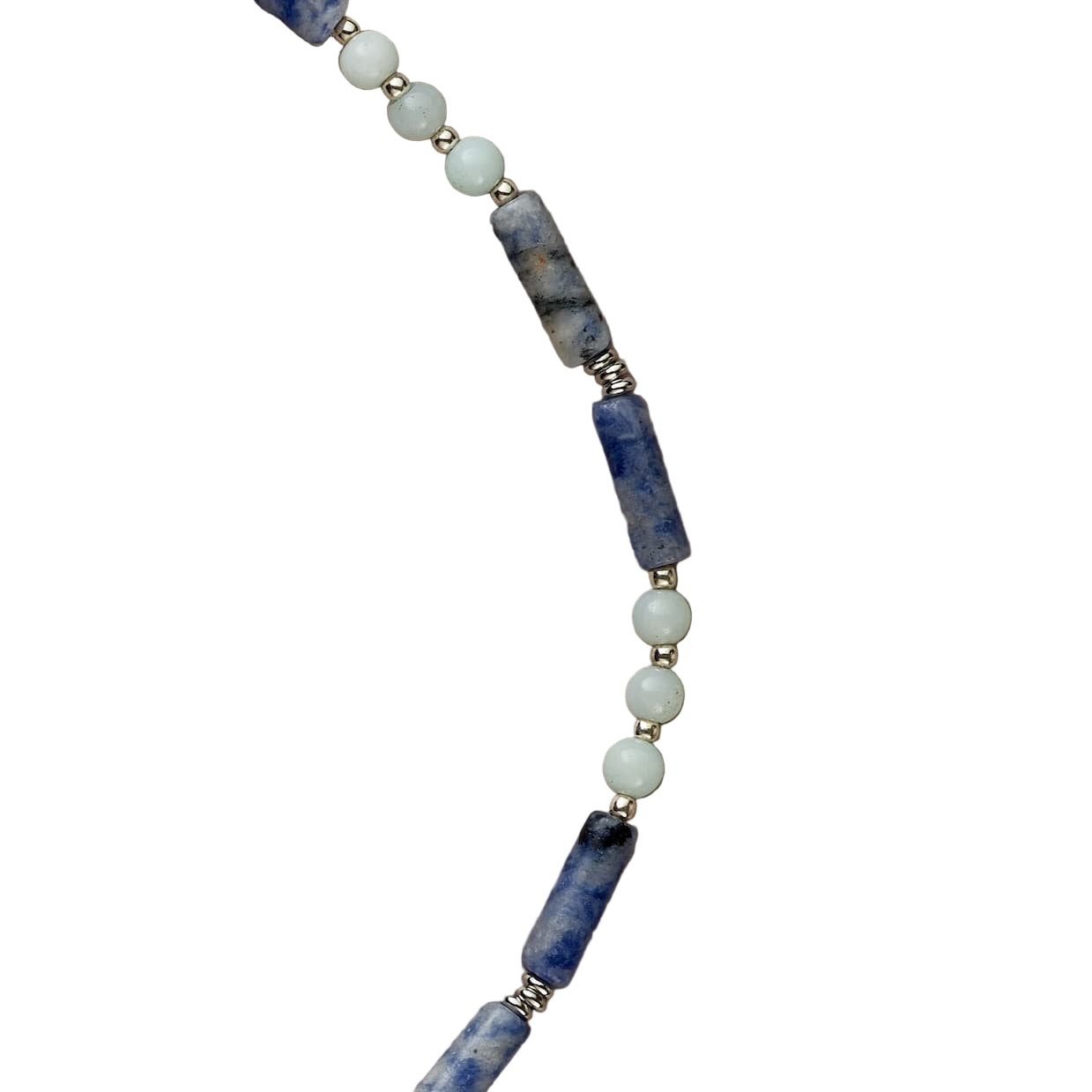 Necklace with blue and white beads on a beige background